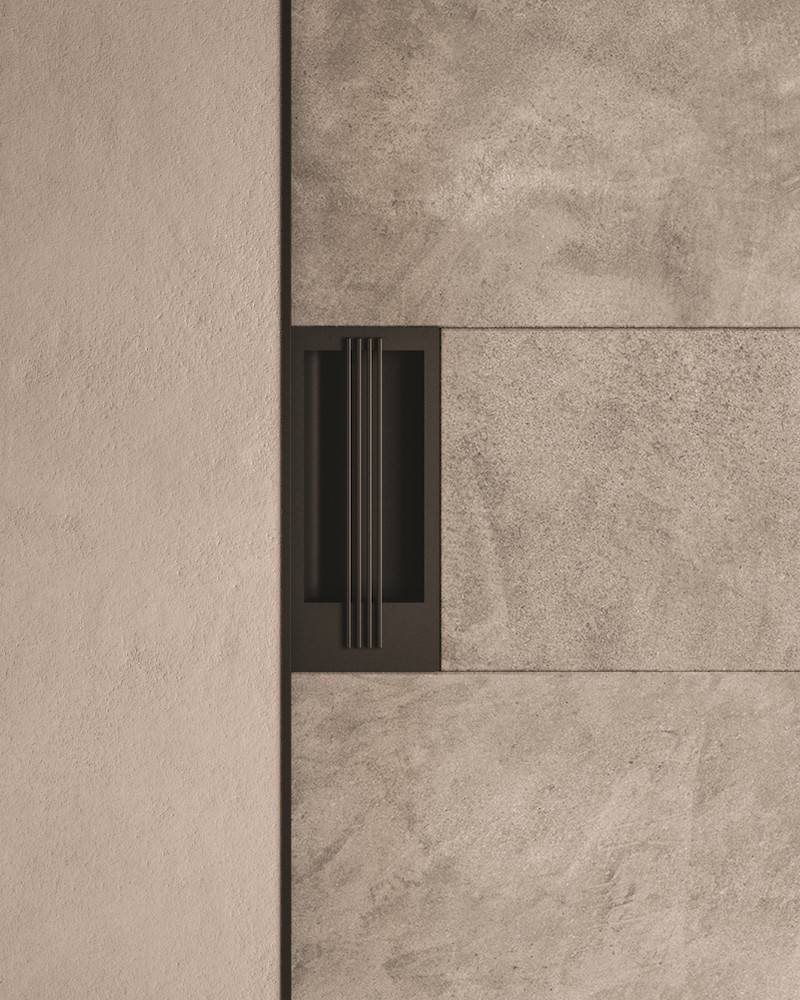 Dettaglio maniglia: Vela porta scorrevole blindata di Oikos Venezia Dettaglio maniglia: Vela porta scorrevole blindata di Oikos Venezia