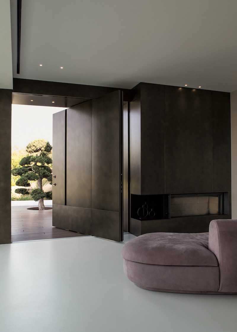 Progetto della studio M3 Progetti  focus sulle porte blindate a bilico Synua 3TT di Oikos Venezia